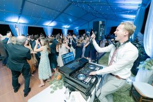 How a Corporate DJ Can Boost Employee Morale and Engagement